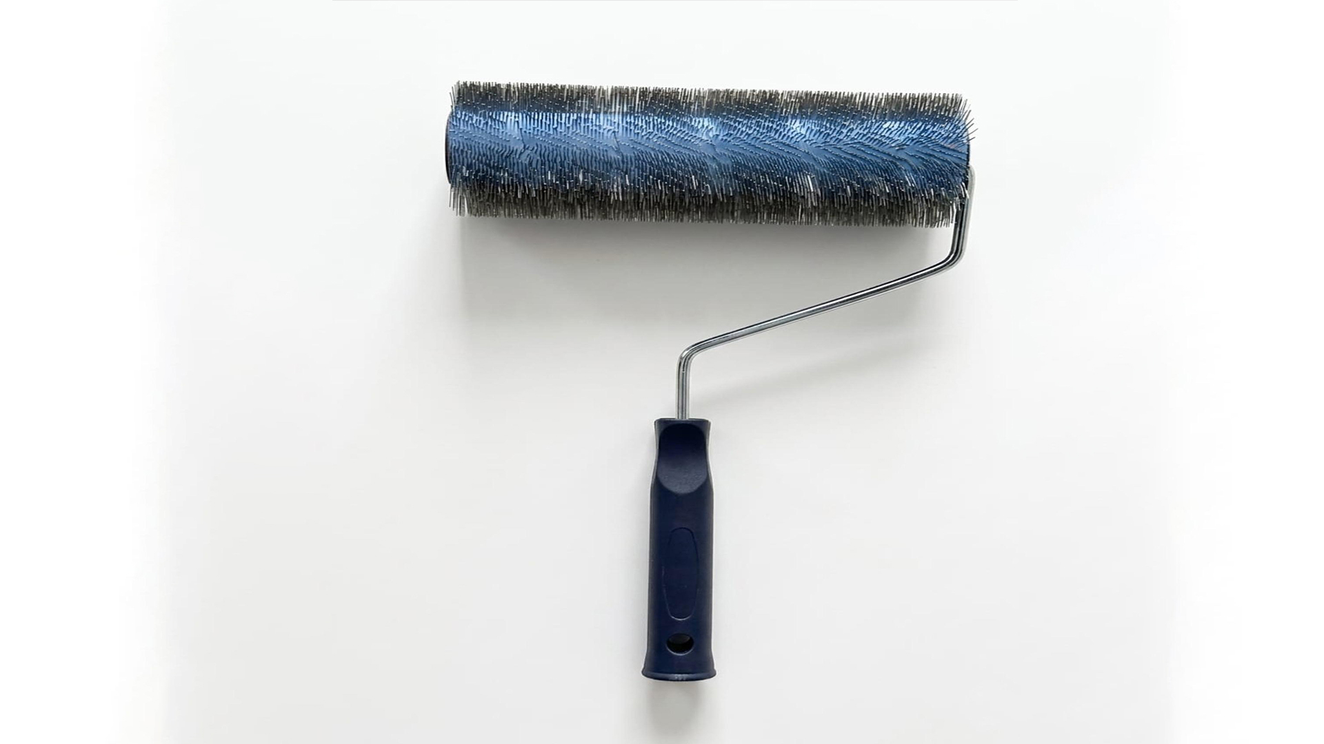 Metal spiked roller